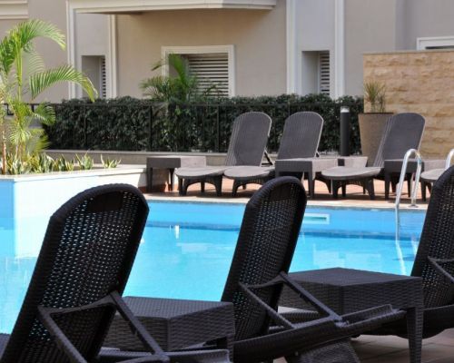 pool seating at Mivida Apartment for rent by Axxodia accommodation in Egypt