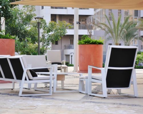garden seating area at cairo festival city living rentals by axxodia